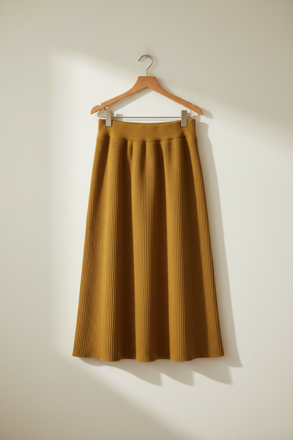Front view 1 – full length on hanger against white wall